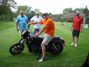 Steve Jones on the Harley w his foursome 8-10-15